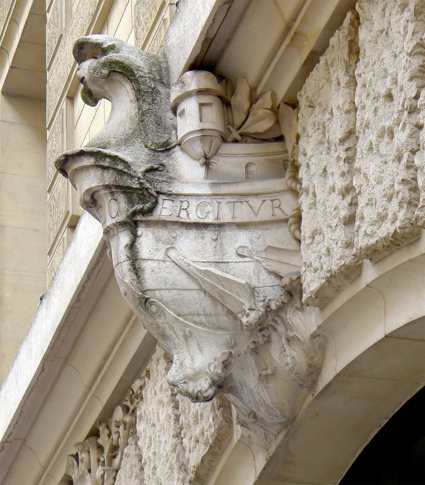 Carved doorway detail at 70 Rue Jean-Jacques-Rousseau, Paris